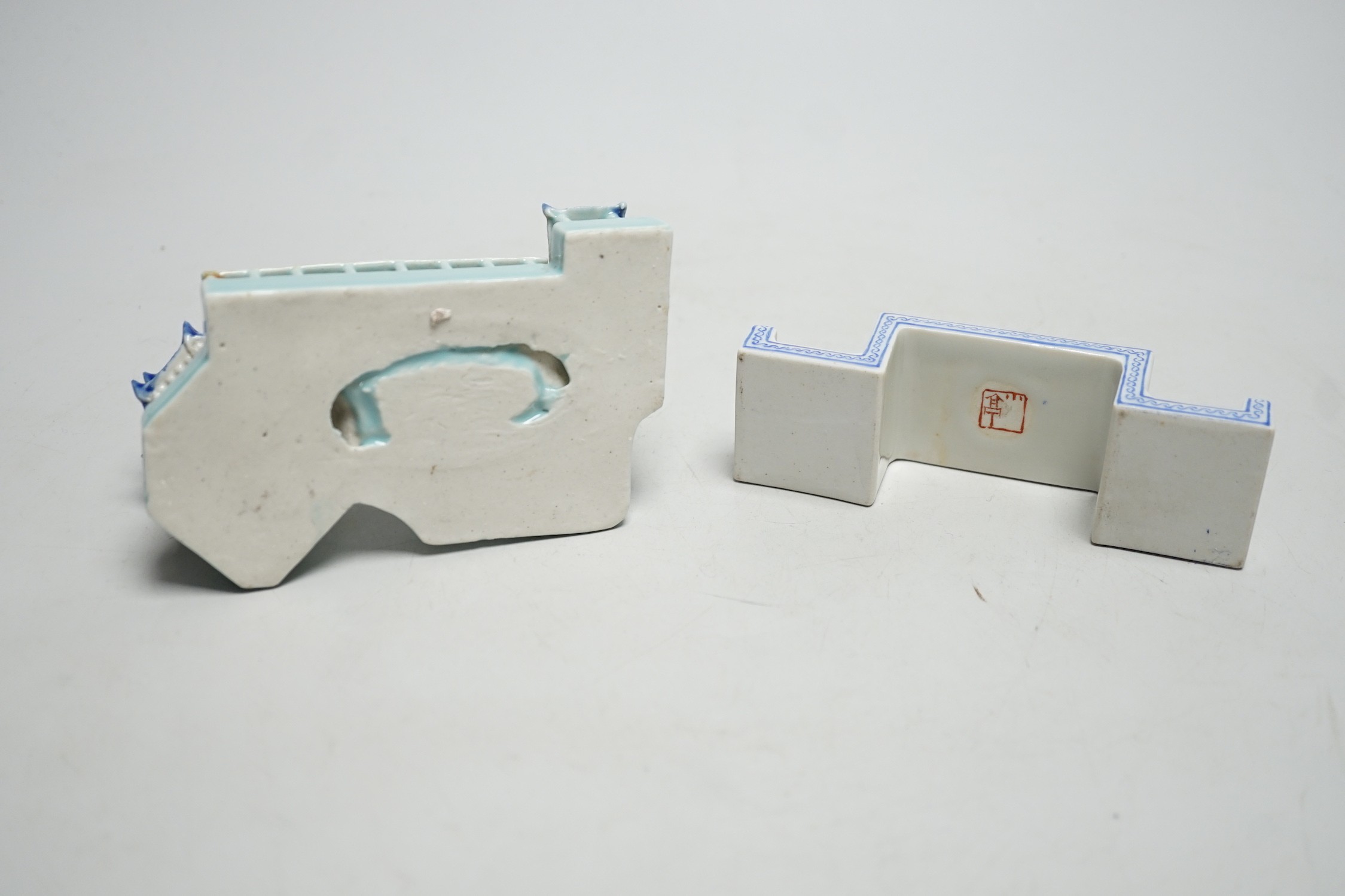 A Chinese model of pavilions and an enamelled porcelain ink stand, 12.5cm